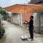 Thay bạt áo dù che nắng ngoài trời ở Quận 8